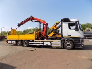 Palfinger crane and pile driver on custom truck body